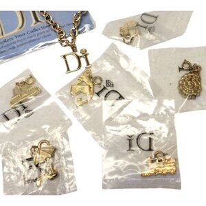 Lot of VTG 7 DI Diamonds Int CARIBBEAN Charms & gold Bracelet Cruises CONCH SHEL